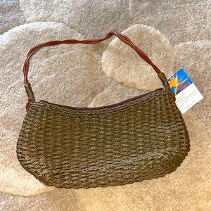 BNWT small purse designed in Hawaii w corded handle approx 12” wide x 6” long
